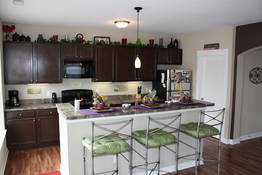 Kitchen with breakfast bar and chairs